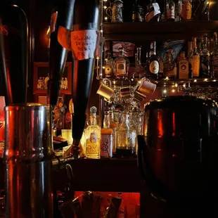 a bar filled with bottles of alcohol