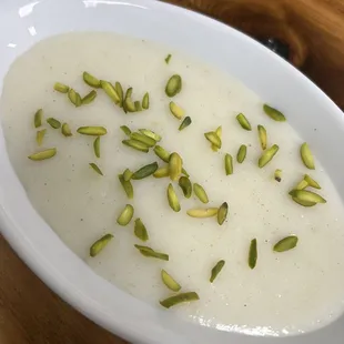 Frini-- an Afghan milk pudding/custard flavored with pistachio and cardamom