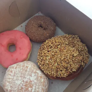 a variety of donuts in a box