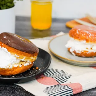 two donuts on plates