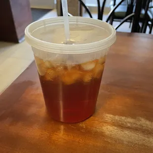 a drink in a plastic cup