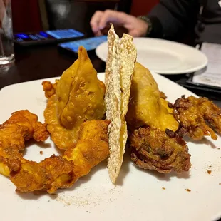 two fried food items on a plate