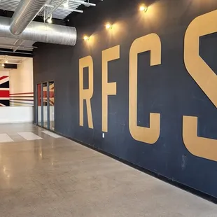 a hallway with a sign that says fees