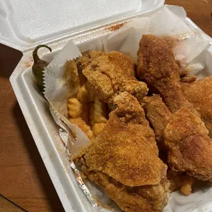 Pickles and jalapeño on the top left