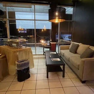 a living room with a view of the city