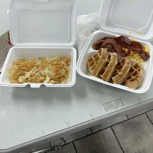 Waffle breakfast with a side of hash browns.