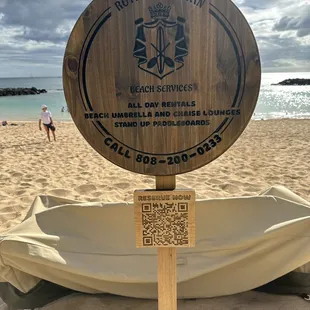 Sign on the beach. Call, use the QR code or book on their website