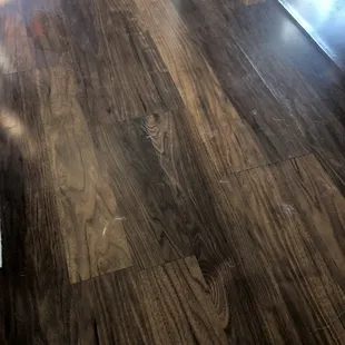 The fur and water left on the floor from him laying down