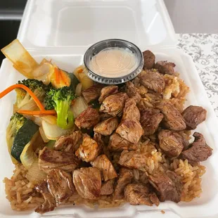 Hibachi Steak served with fried rice, mixed vegetables and yum yum sauce