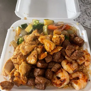 Hibachi Steak, Chicken &amp; Shrimp served with fried rice and mixed vegetables