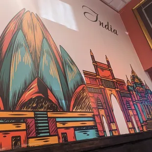 a picture of a mural on the wall of a restaurant