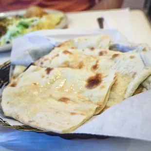 Naan : buttery and lite. Perfect to dip in the Bhuna Goat