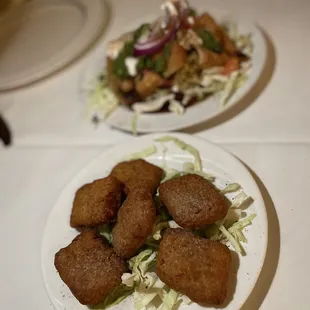 two plates of food on a table