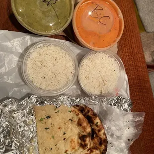 Rice, Palak Paneer, Butter Chicken. Garlic naan.
