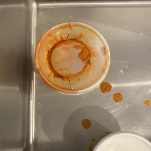 a dirty bowl in a sink