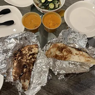 Butter chicken, naan, and lamb Lamb Tikka Masala