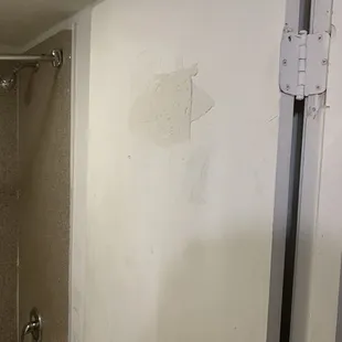 Punched through door.