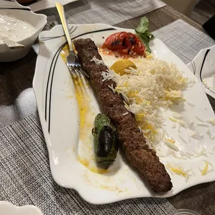 a kebab and rice dish