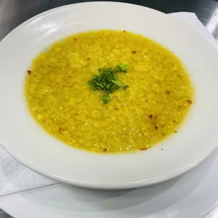 a bowl of soup on a plate