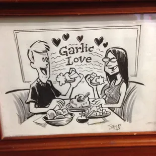 The cutest photo, on counter, beside register!