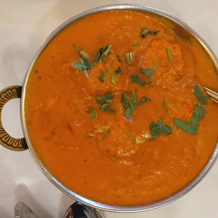 the Chicken Tikka Masala (boneless cubes of grilled chicken in Tandoor and cooked in a rich creamy tomato and onion sauce)