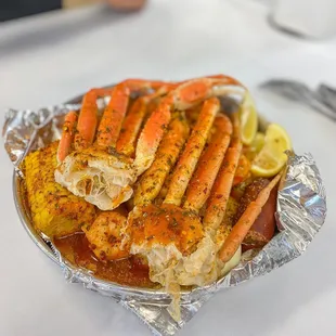 king crab legs and potatoes in foil