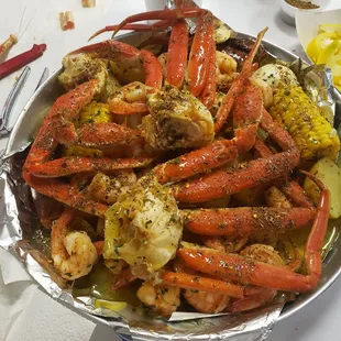 #1 crab, shrimp. Potatoes, sausage, boiled eggs. Corn, lemon butter