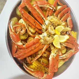crab legs and corn on the cob