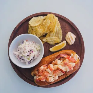 World Famous lobster roll with our house coleslaw and garlic mayo!