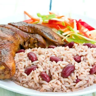 a plate of rice and meat