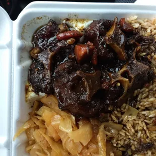 Small Oxtail plate, simply put some of the best in Maryland. The gravy is well seasoned. Cabbage is good.