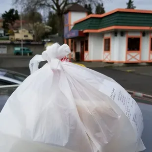 Curry with rice, to-go!!! Great for pre-order grab and go work lunch. Restaruant in background.