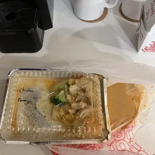 The restaurant improperly packaged the curry in this box resulting in it leaking entirely into the bag and it was inedible.