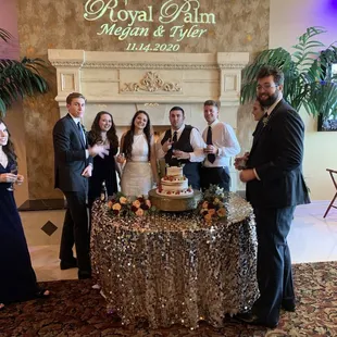 Cutting the wedding cake.