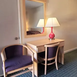 Extended rooms offering comfortable seating and working areas