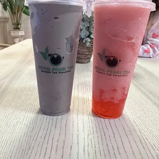 Cookies and cream milkshake and strawberry slushie with popping bubbles