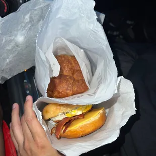 Ham and Cheese Croissants and Sausage Egg and Cheese on Bagel with Bacon