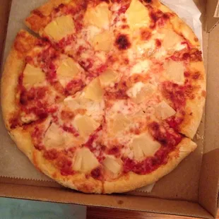 Small pizza with pineapple