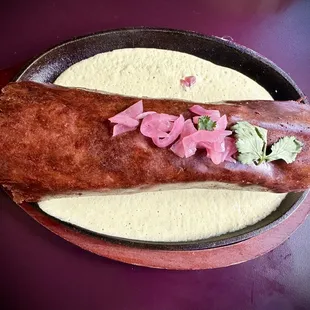 Breakfast burrito with crunchy cheese wrap (top view)