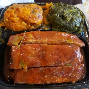 Rib dinner with sweet potatoes and greens