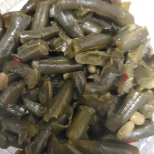 a plate of green beans and greens