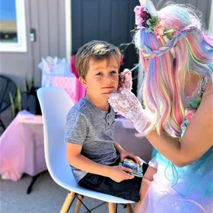 Such talented face painters! We can do full face and small designs for the hand or cheek.