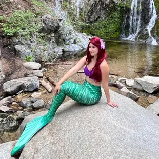 Ariel's swum up from Atlantica to say hello to your little one!