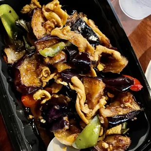 a tray of stir fried vegetables