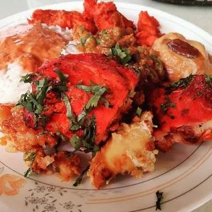 a plate of chicken and rice