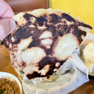 Garlic Naan is Crispy and looks like a Yoda/Elephant Man vibe