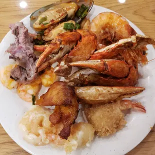 a plate of seafood and rice