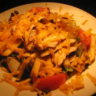 Grilled Chicken with french fries, tomatoes, onions and tons of Cheddar Cheese....YUM!!