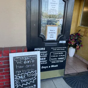 a sign outside a door