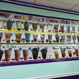 a display of fresh fruit smoothie drinks